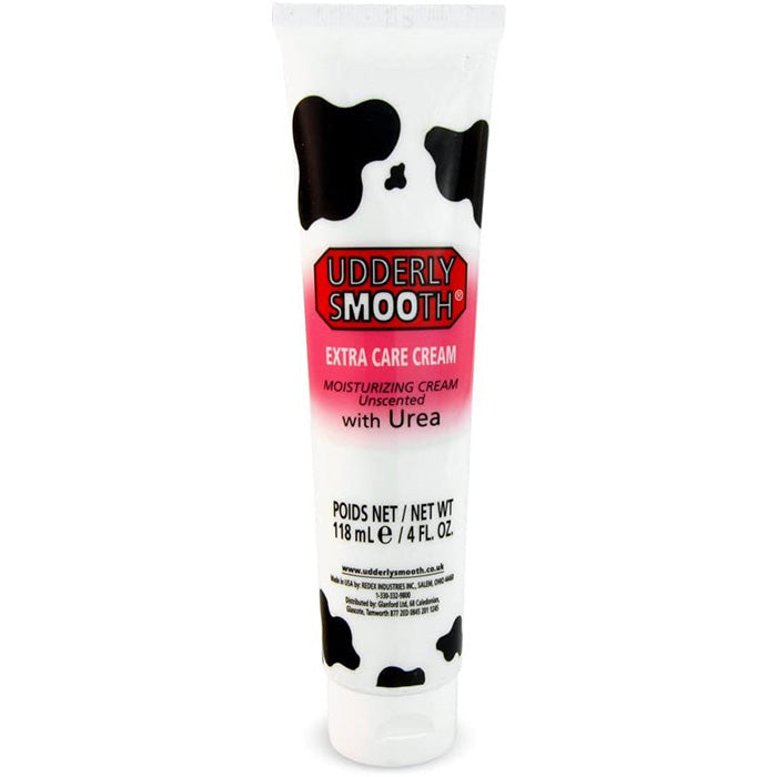 White tube of Udderly Smooth Extra Care Cream with cow spot design and pink central colouring surrounding the product name. Text 'Udderly Smooth, Extra Care Cream, Mousturizing Cream, Unscented, with Urea. 118mL/4 FL. OZ.'